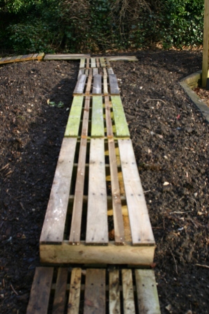 New boardwalk made of old wooden pallets